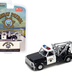 1969 Chevrolet C-30 Dually Wrecker Tow Truck Black and White CHP "California Highway Patrol" with Officer Figurine 1/64 Diecast Model Car by Greenlight